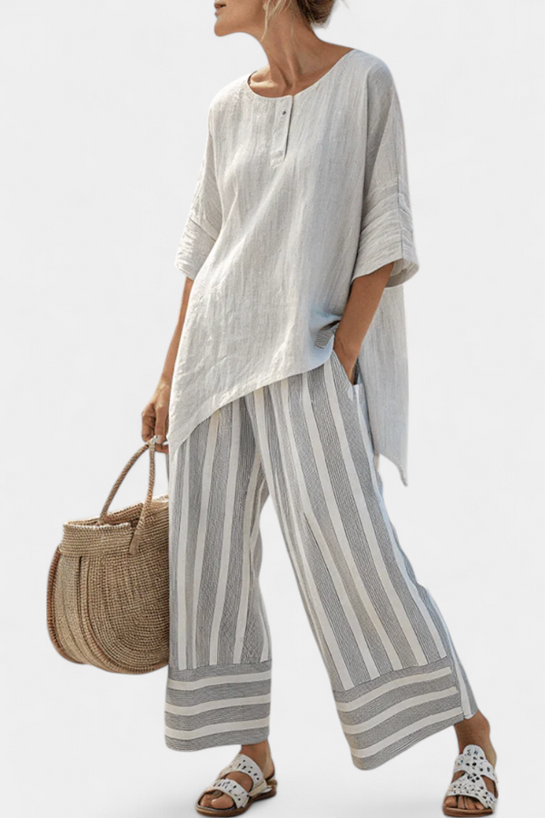 Talvora — Completo Blusa Asimmetrica e Pantaloni a Righe